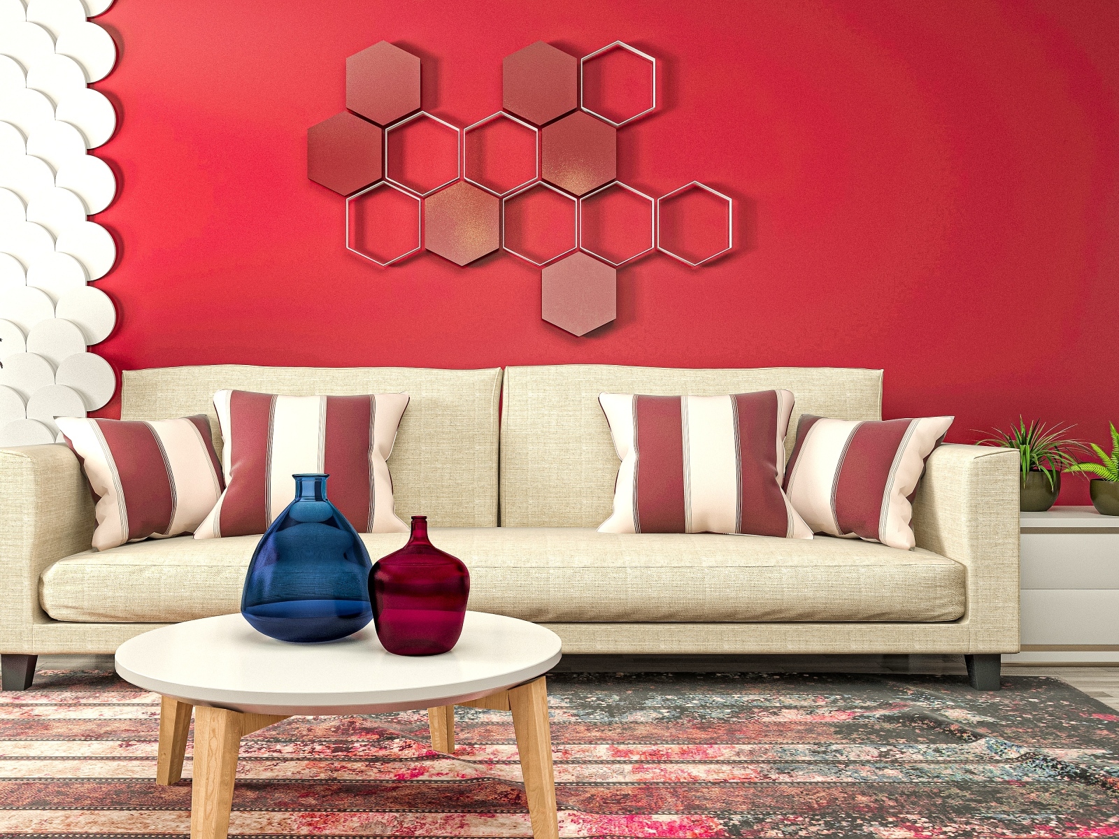 Красная стена в комнате с большим диваном