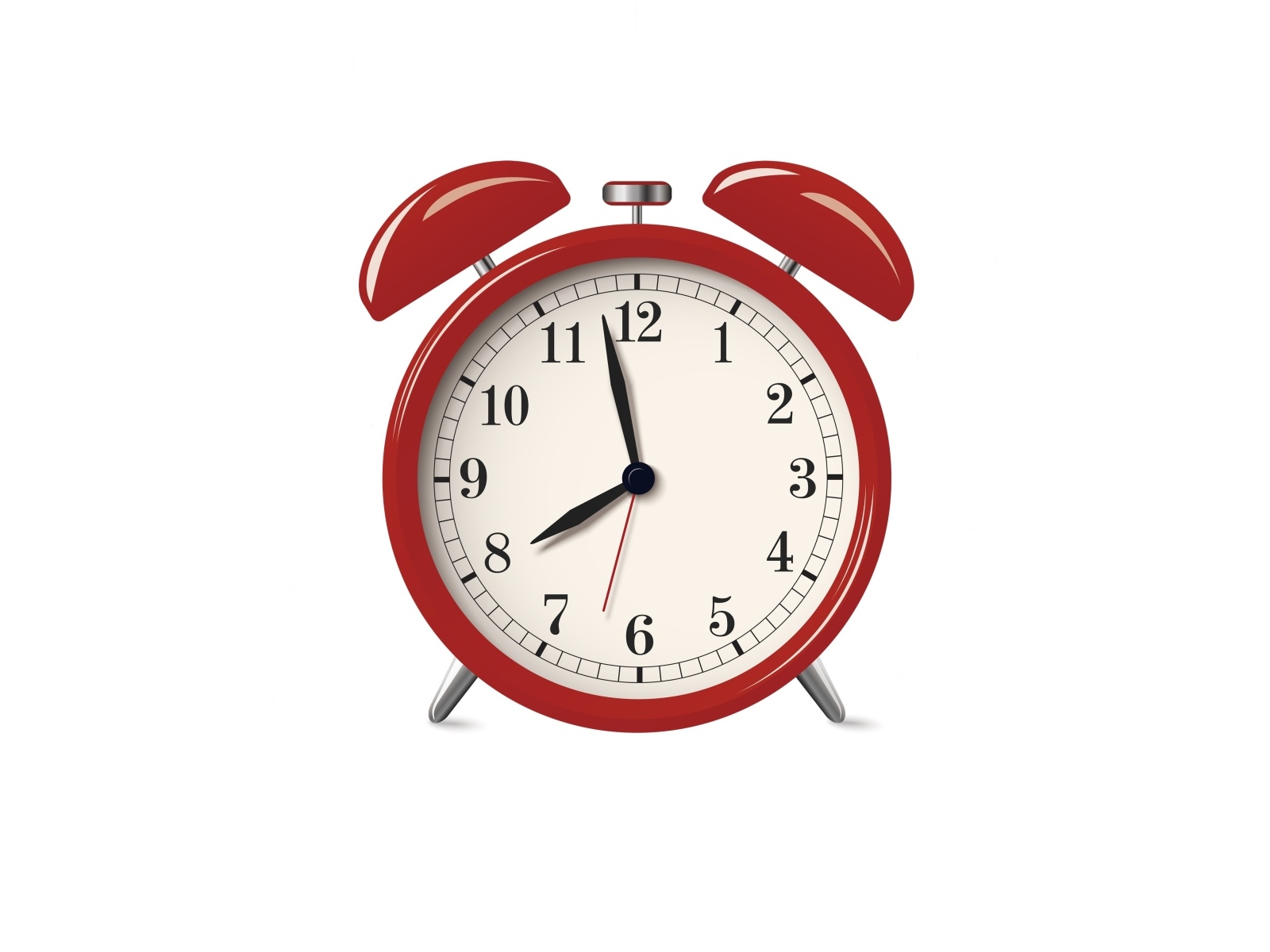 Красный будильник на белом фоне