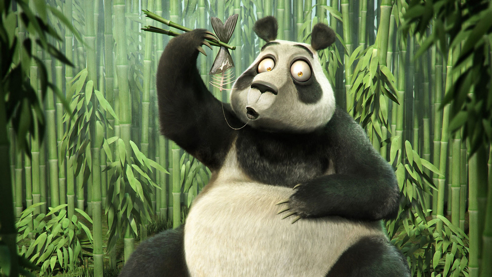 Панда палочками ест рыбу