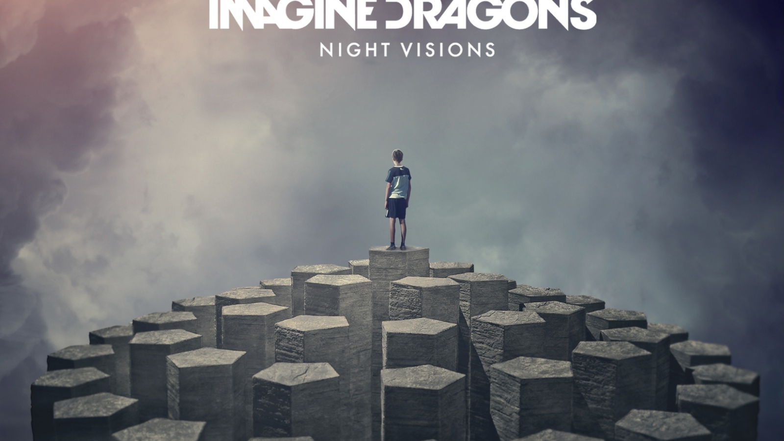 Imagine Dragons: человек на скале
