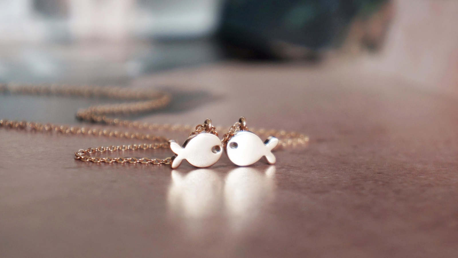 Кулон, рыбы