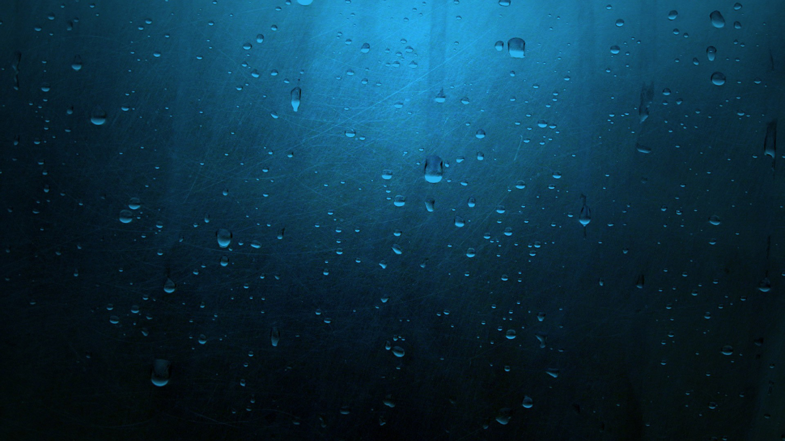 Капли на синем стекле