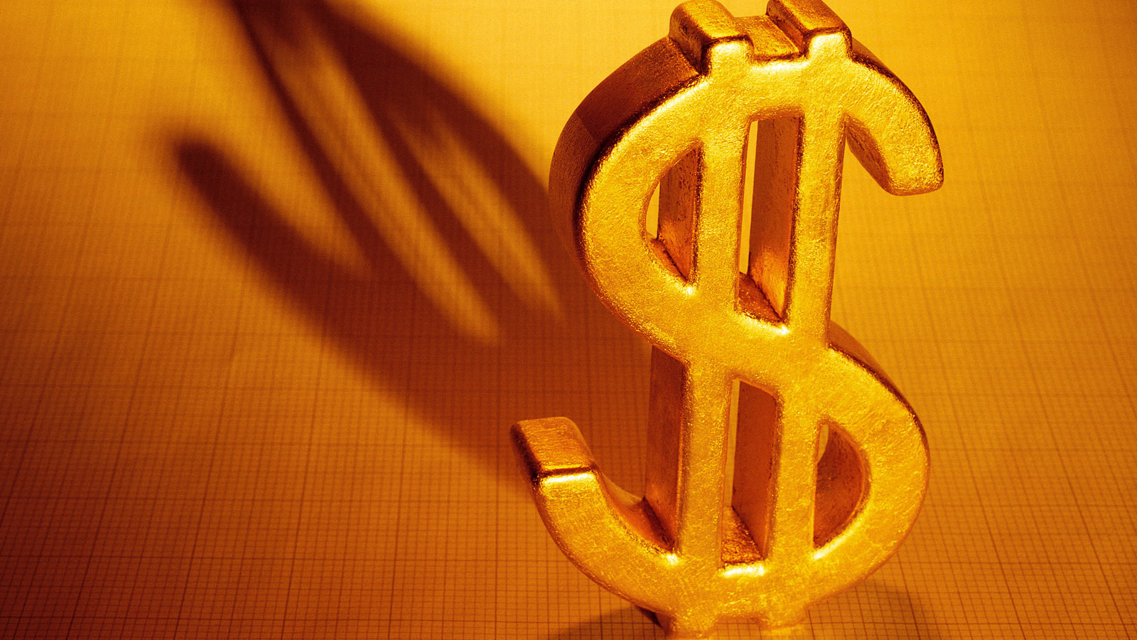 Золотой знак доллара