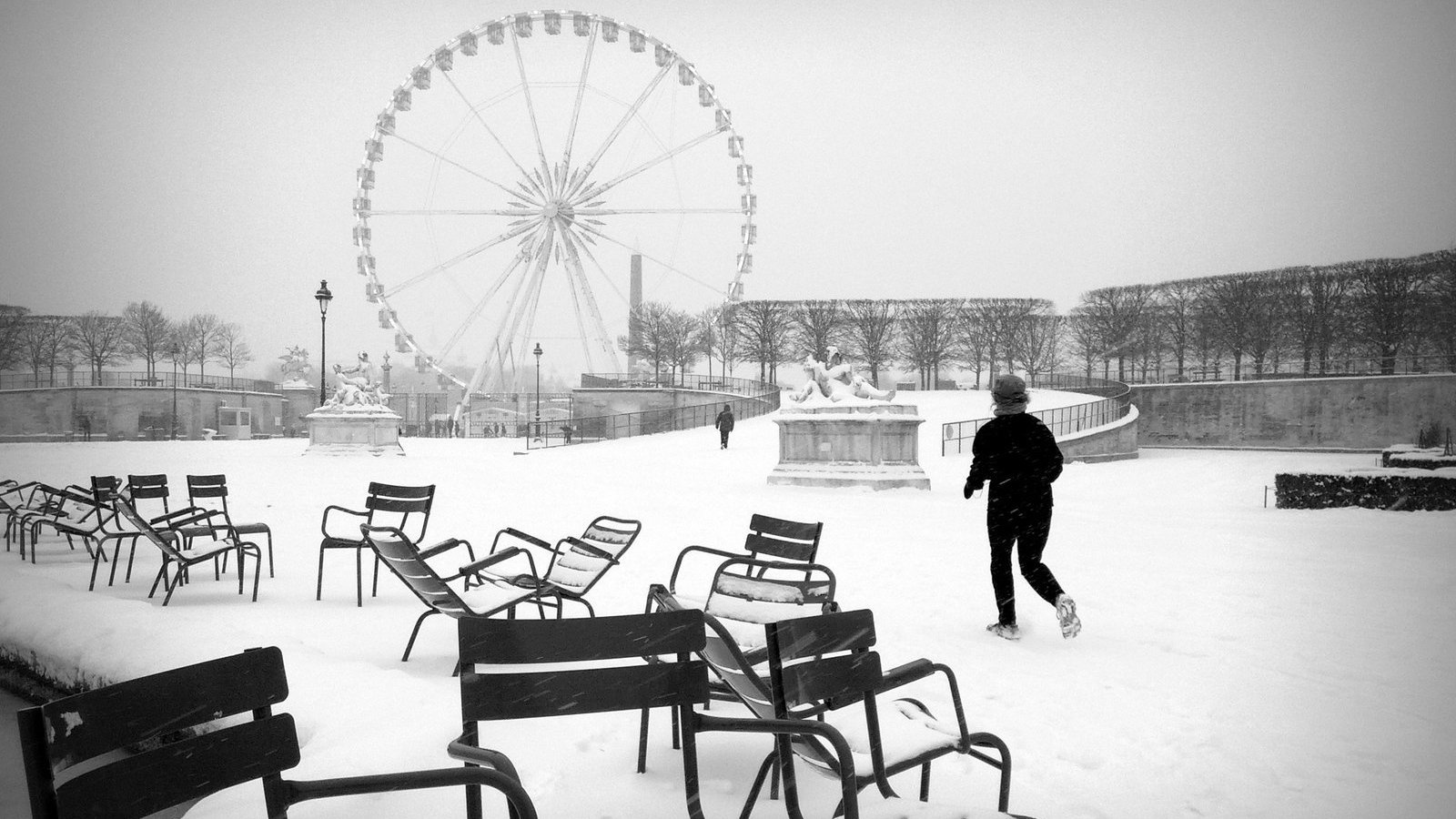 Snow in Paris ferris wheel