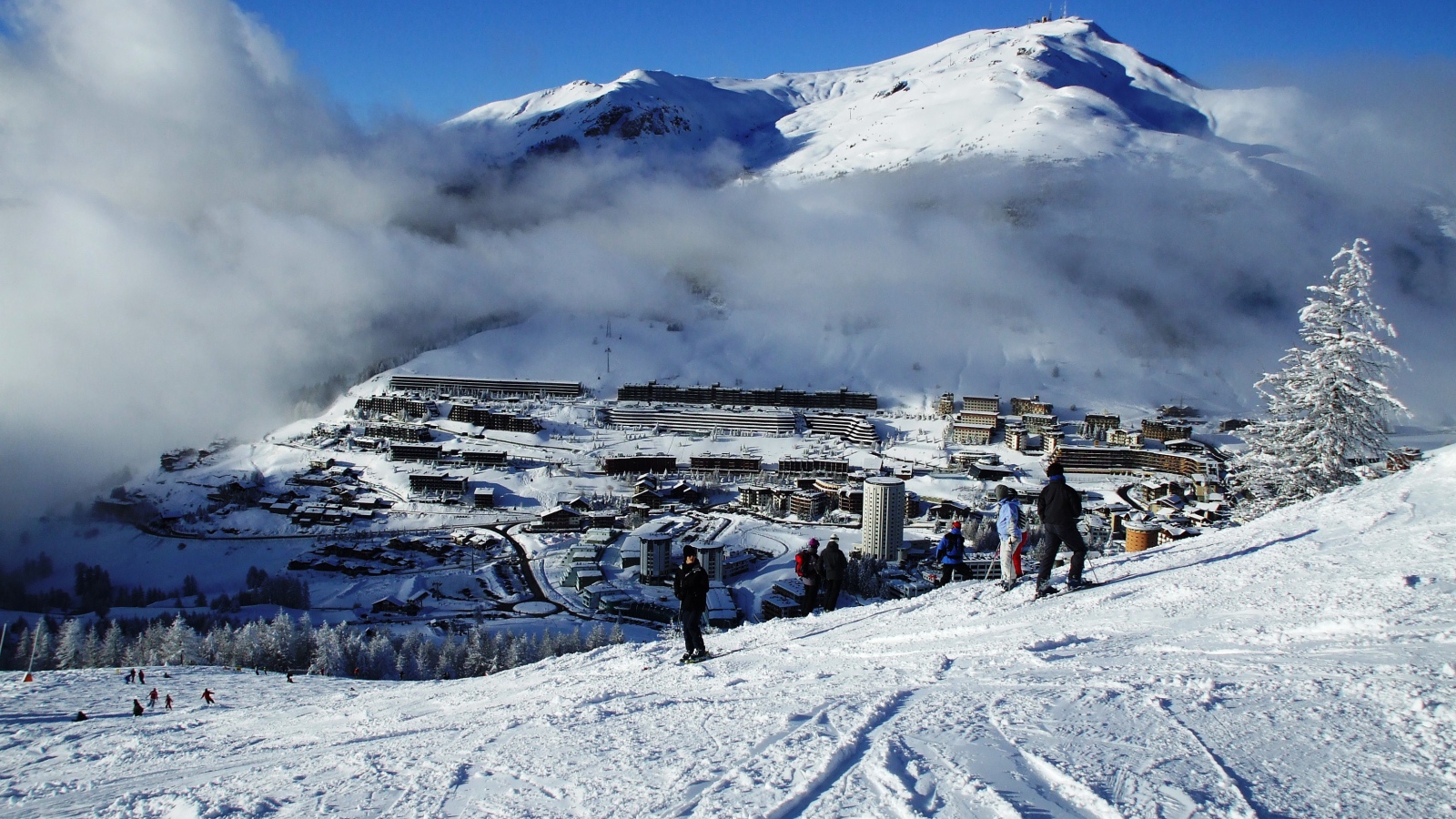 Fog over the city at the ski resort Sestriere, Italy