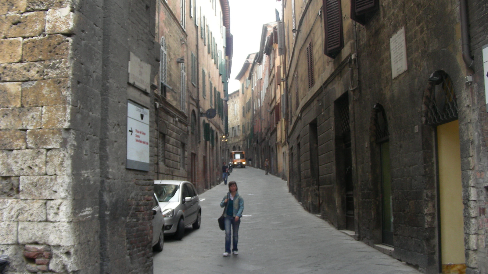 Walk through the narrow streets of Siena, Italy