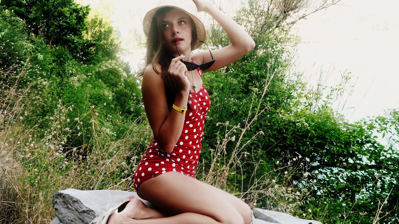 Girl in bathing suit with polka dots