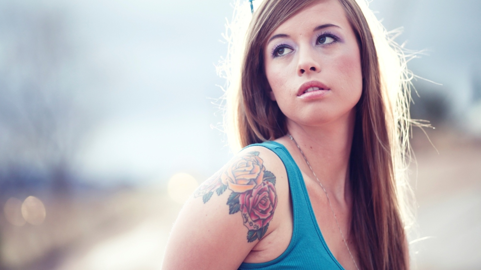 Girl with tattoo roses