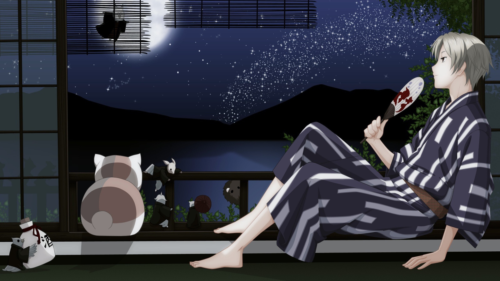 Парень и кот смотрят на луну