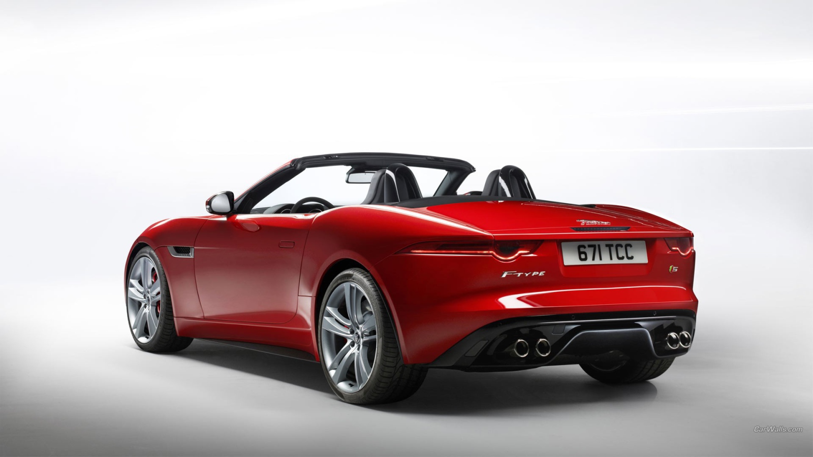 Красный кабриолет Jaguar F-Type
