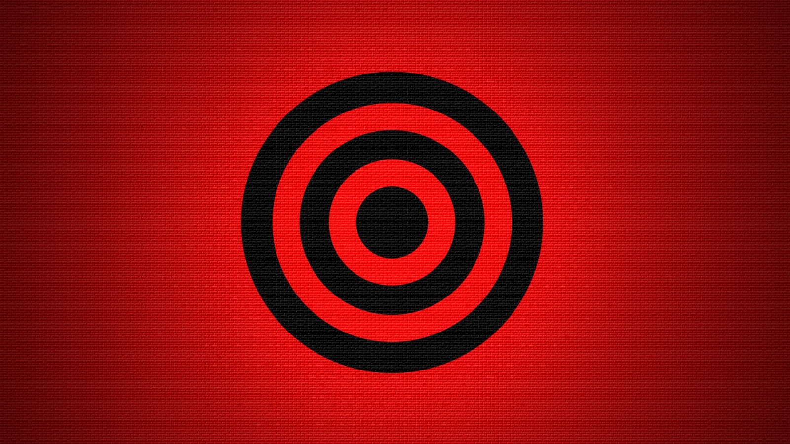 Черная мишень на красном фоне