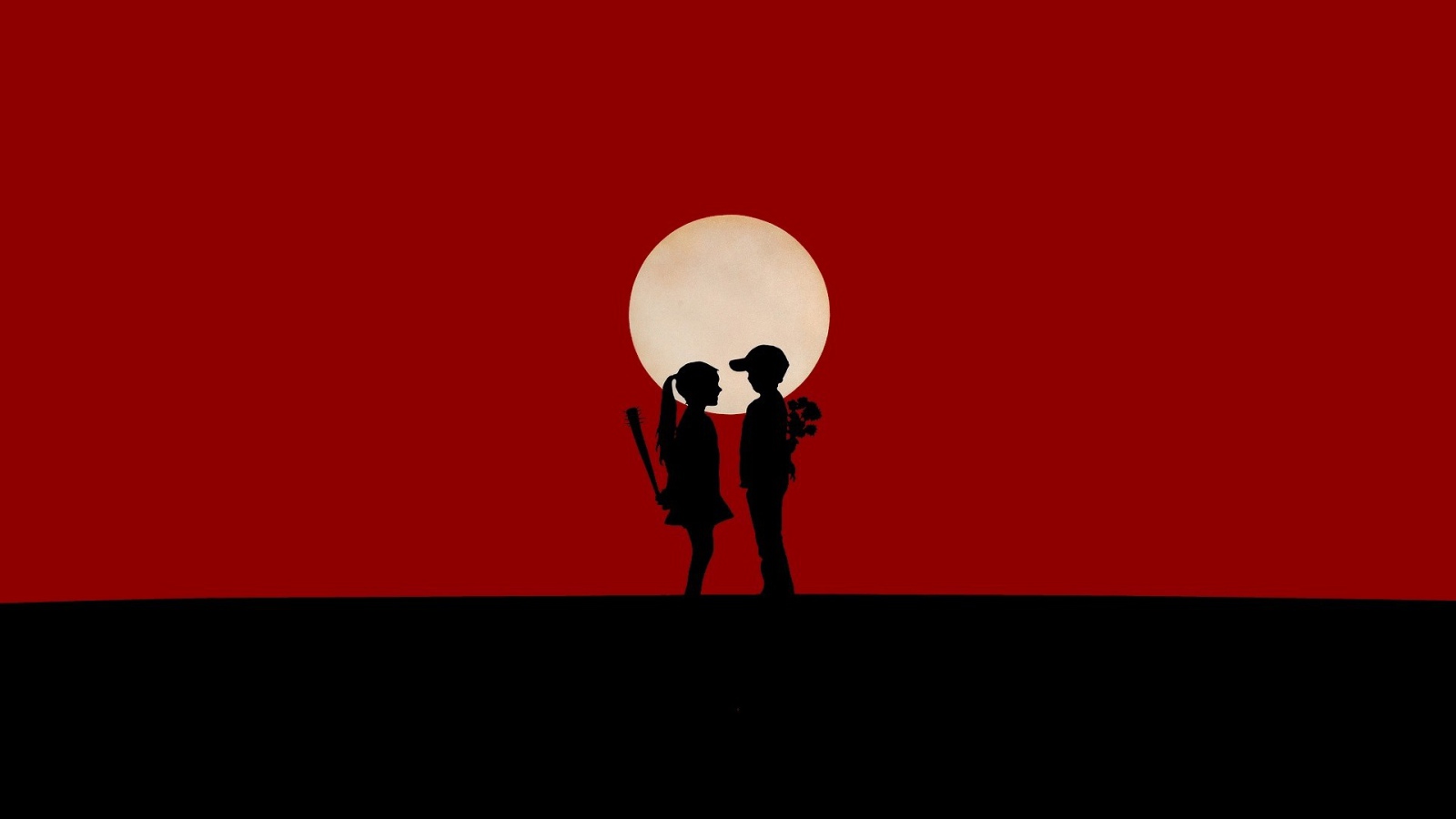 Мальчик и девочка на красном фоне