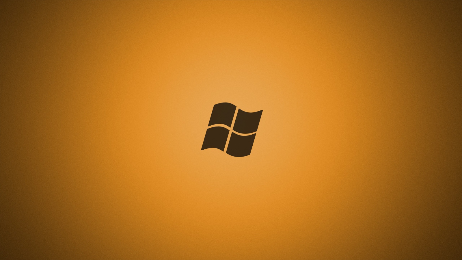 Серый логотип Майкрософт, оранжевый фон