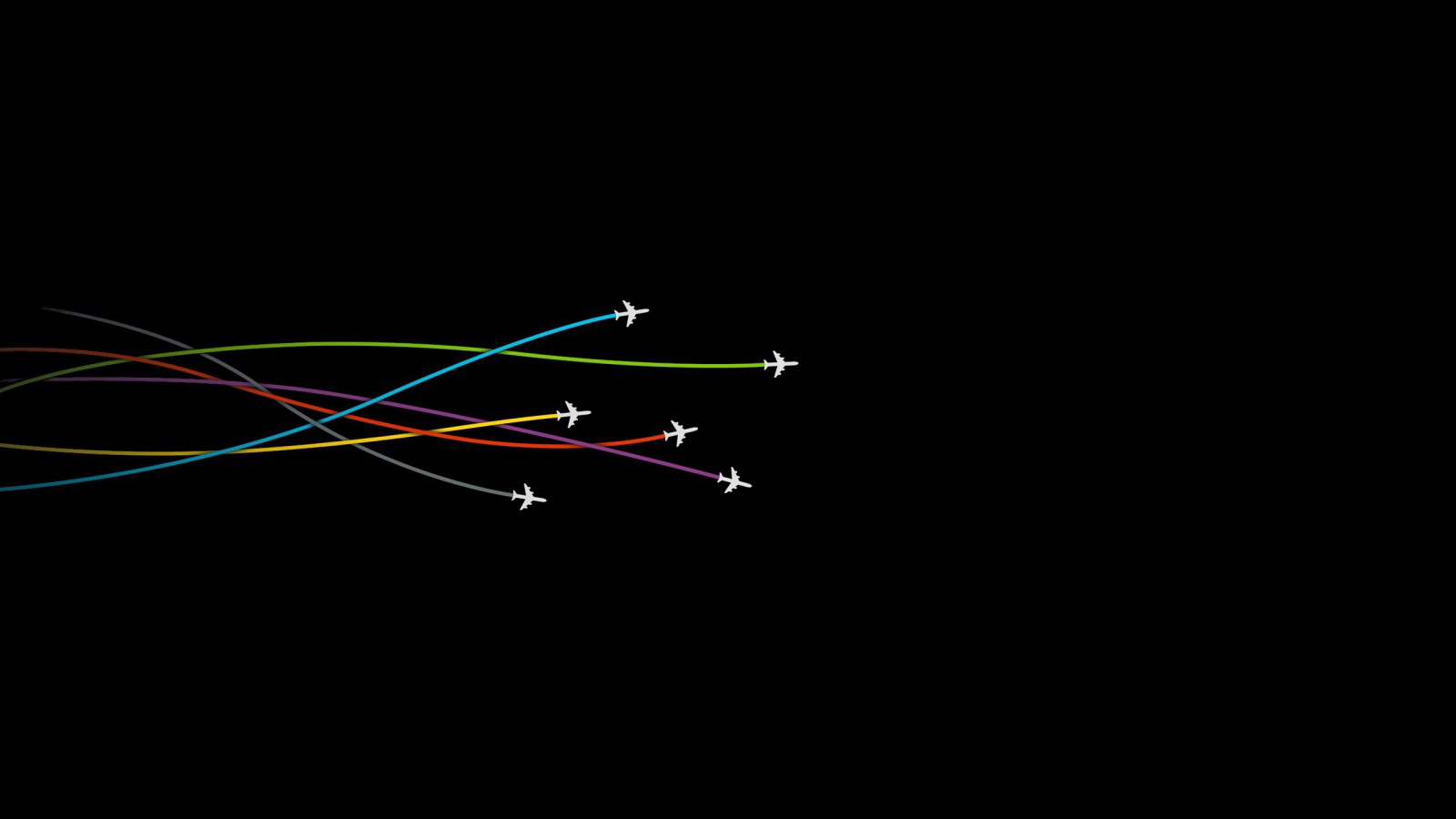 Самолеты оставляют следы на черном фоне