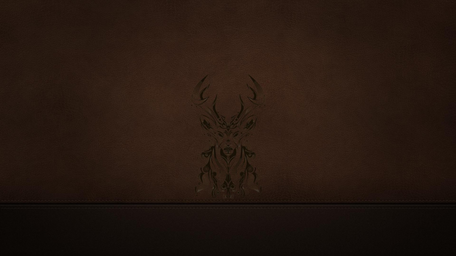 Силуэт оленя на коричневой коже