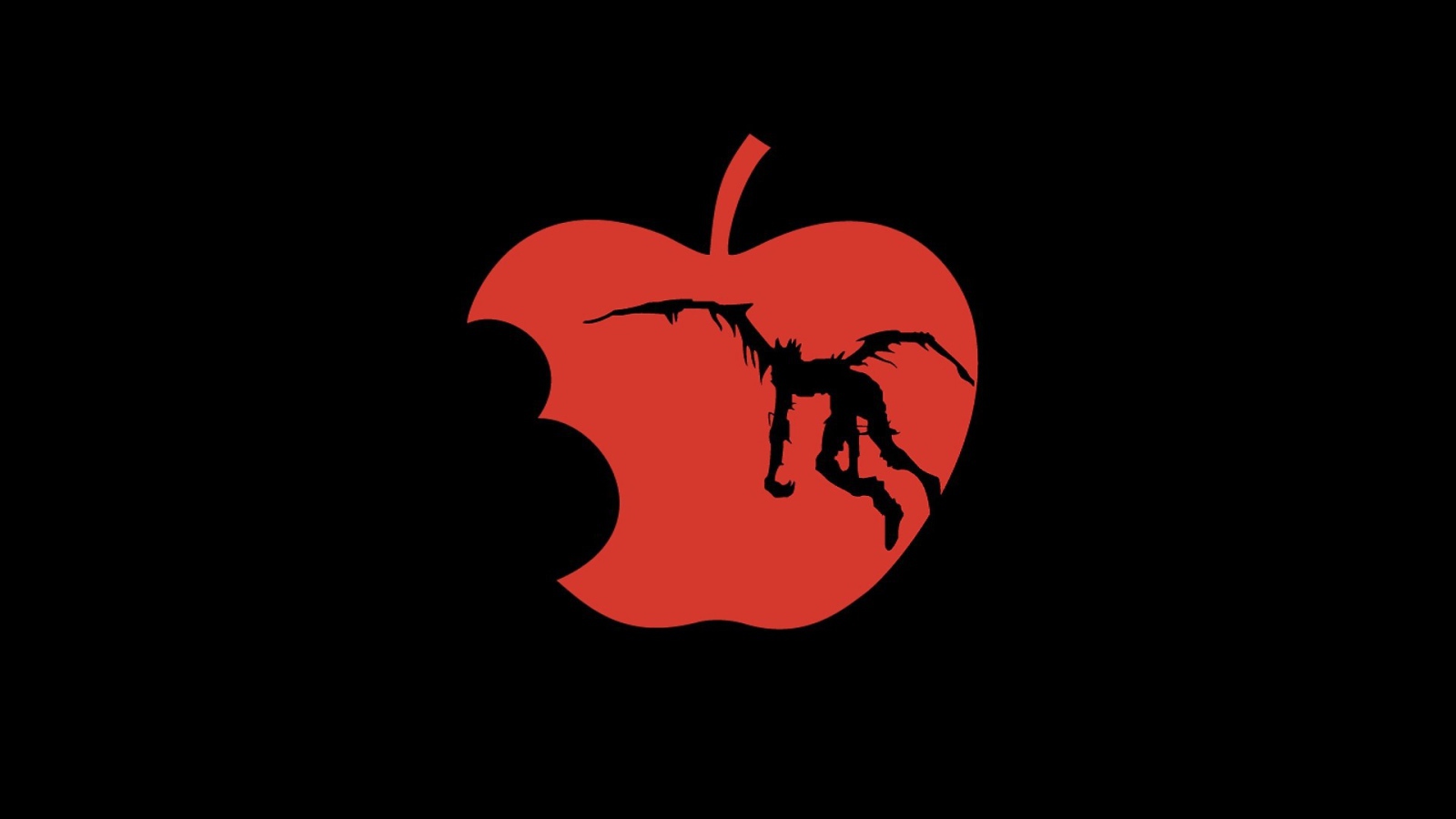 Испорченное красное яблоко, черный фон