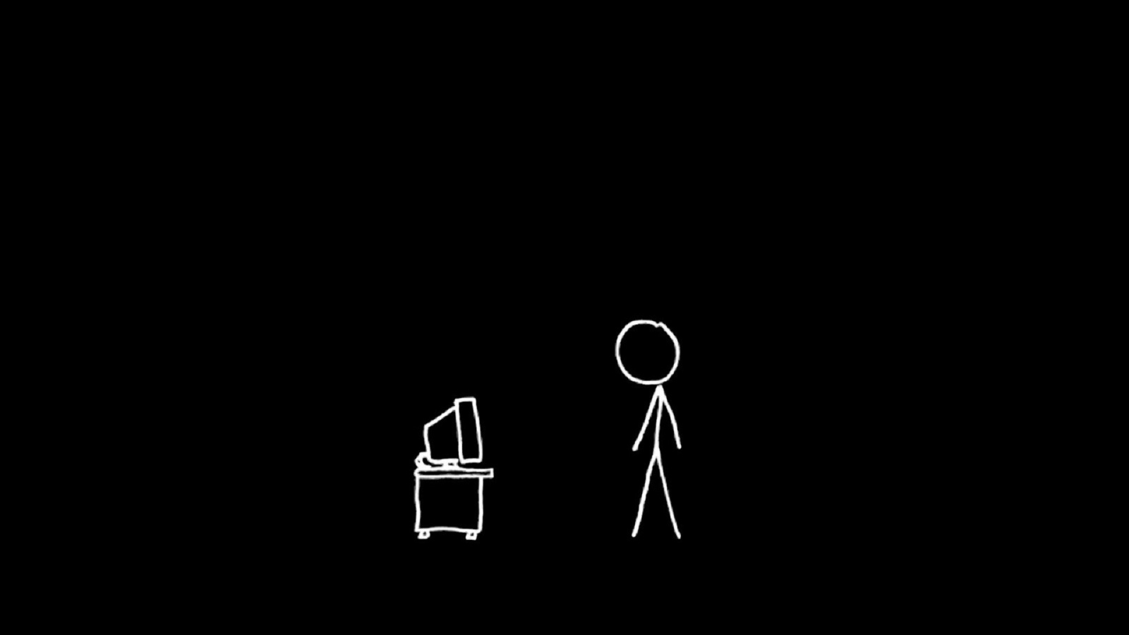 Человек у монитора, черный фон