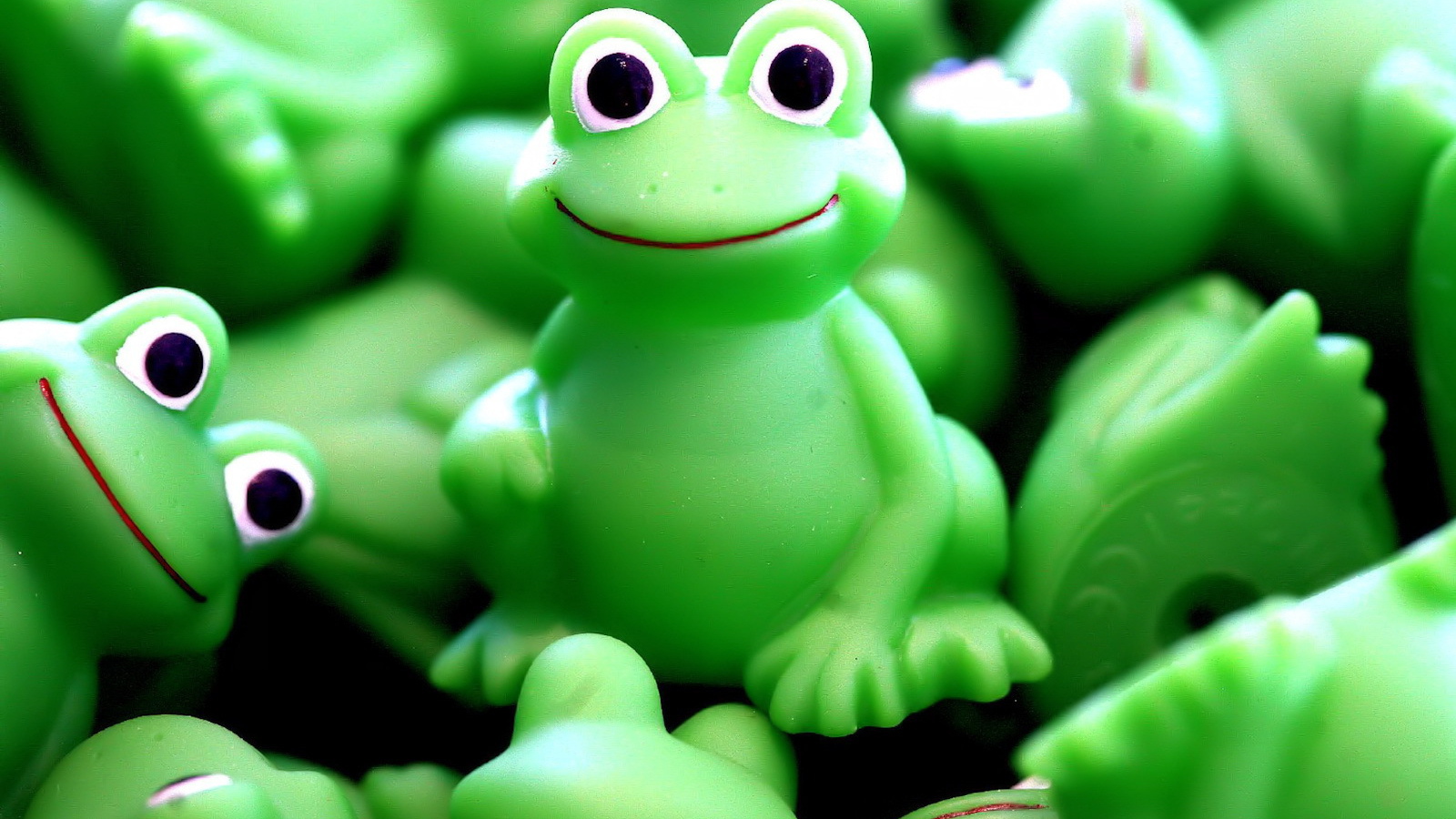 Игрушка лягушка