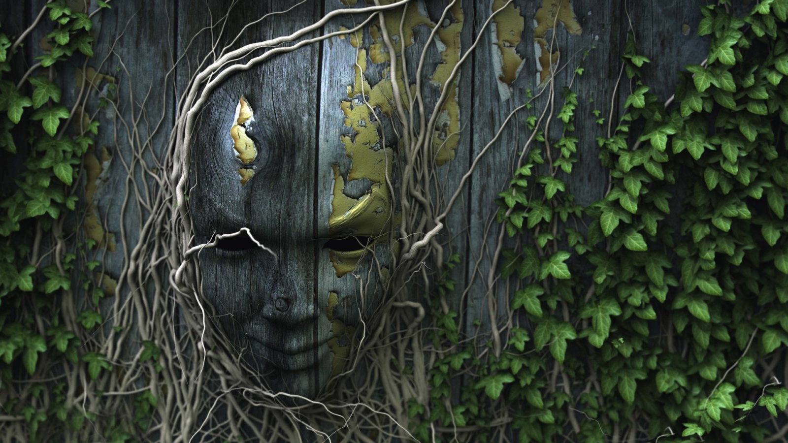 Лицо на деревянном заборе, увитое плющом