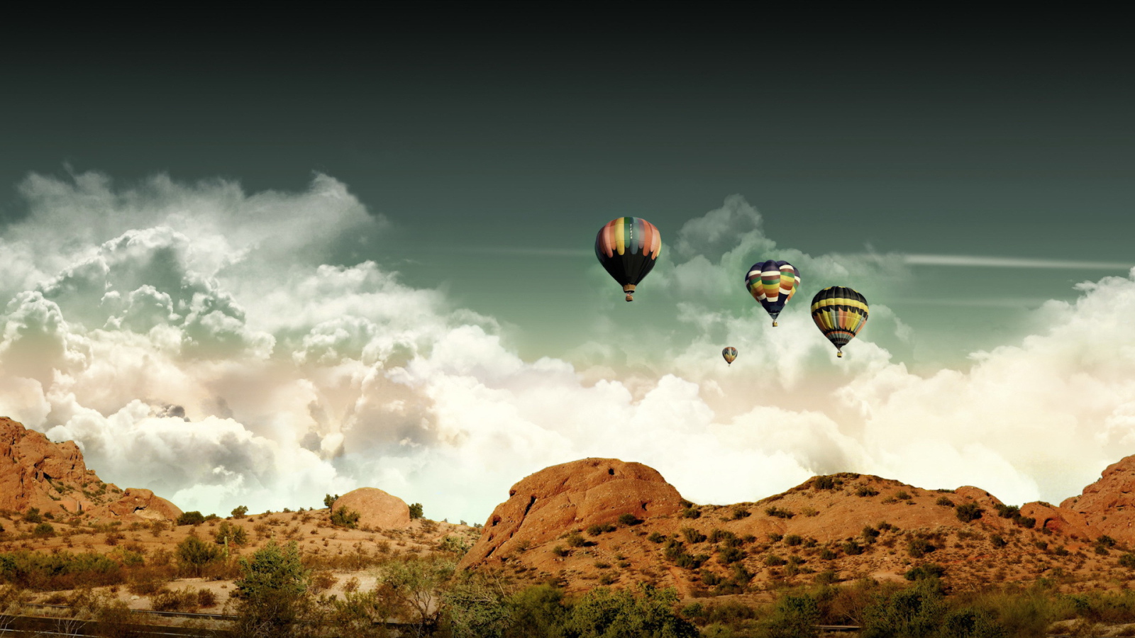 Воздушные шары над холмами