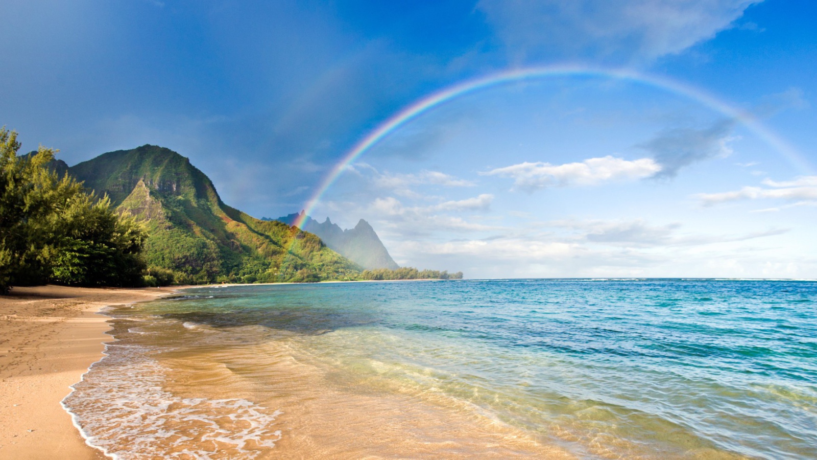 Rainbow over the beach in Hawaii