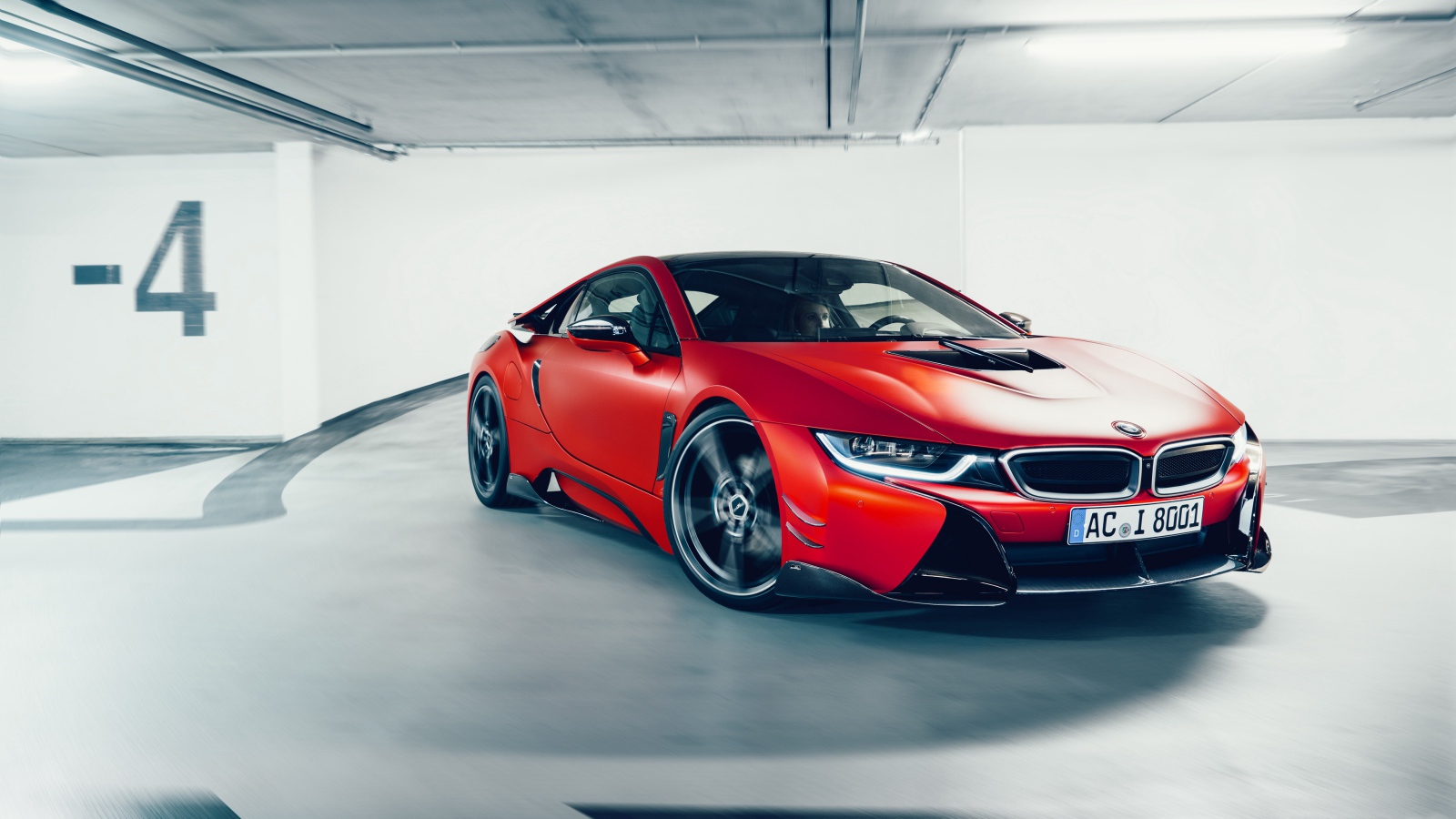 Красный спортивный автомобиль BMW i8 AC Schnitzer ACS8