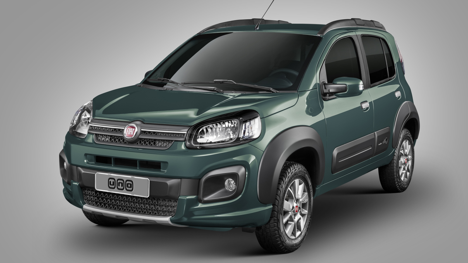 Зеленый автомобиль Fiat Uno Way на сером фоне