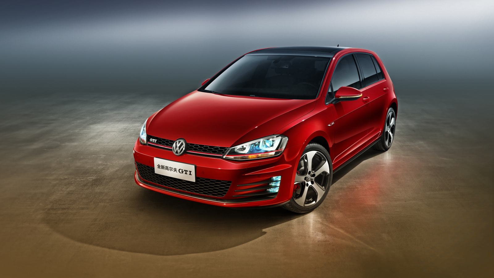 Автомобиль Volkswagen Golf GTI красного цвета 
