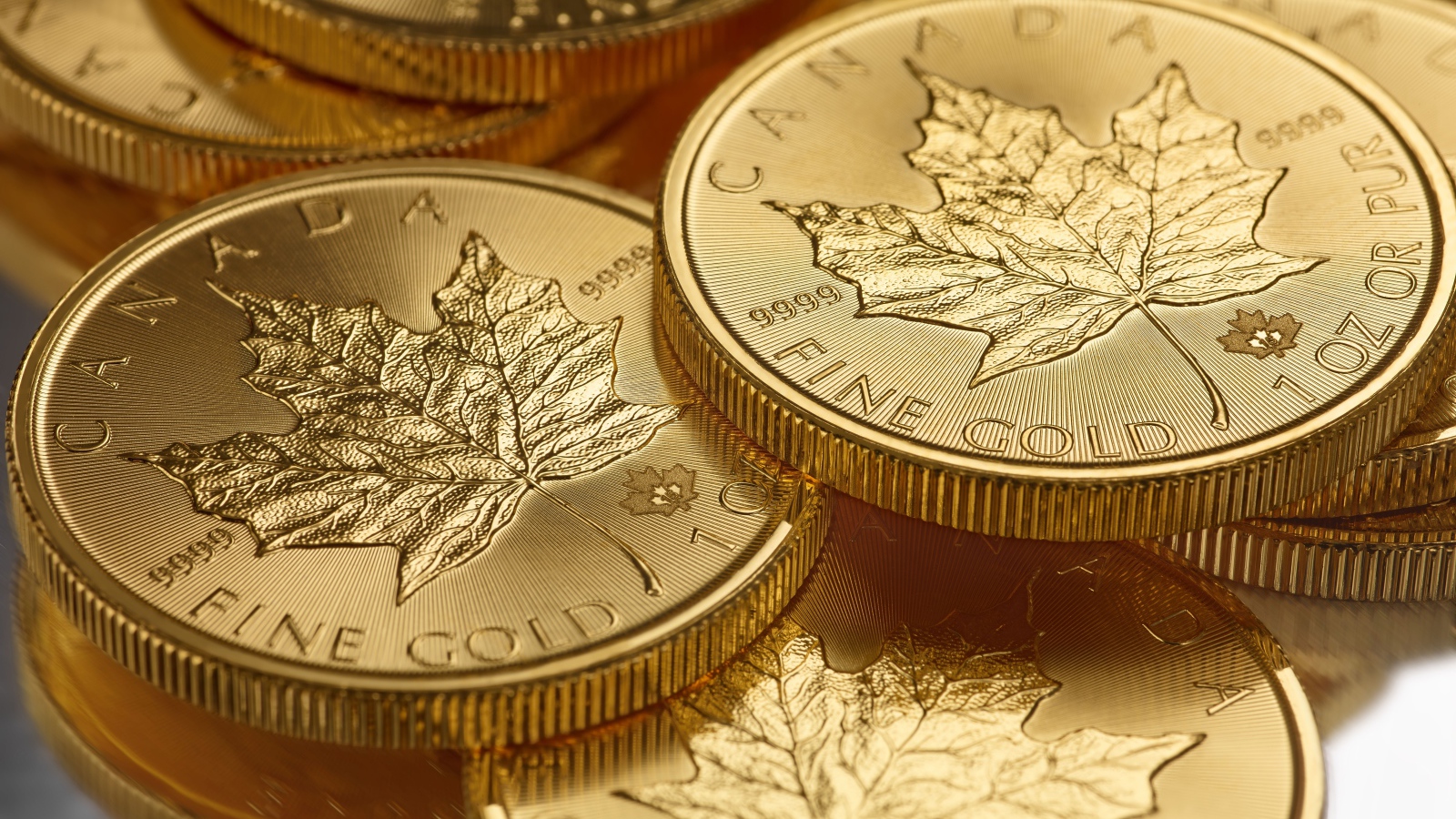 Золотые монеты Канада 