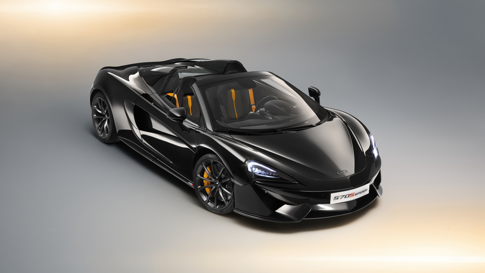 Черный автомобиль кабриолет McLaren 570S Spider, 2018