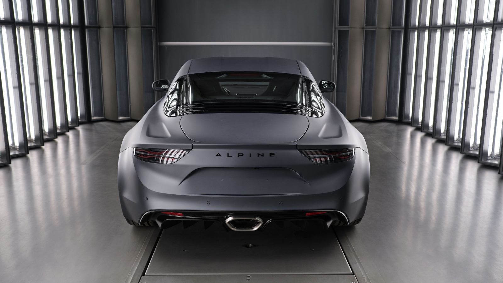 Серебристый автомобиль Alpine A110S, 2019 года вид сзади