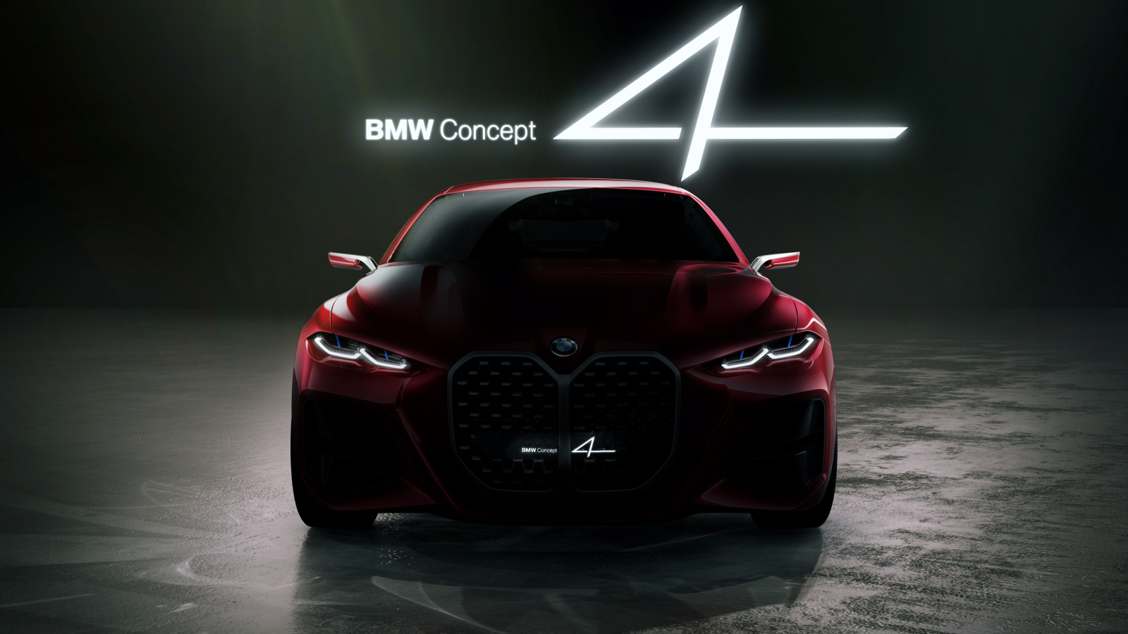 Красный автомобиль BMW Concept 4 2019 года на черном фоне