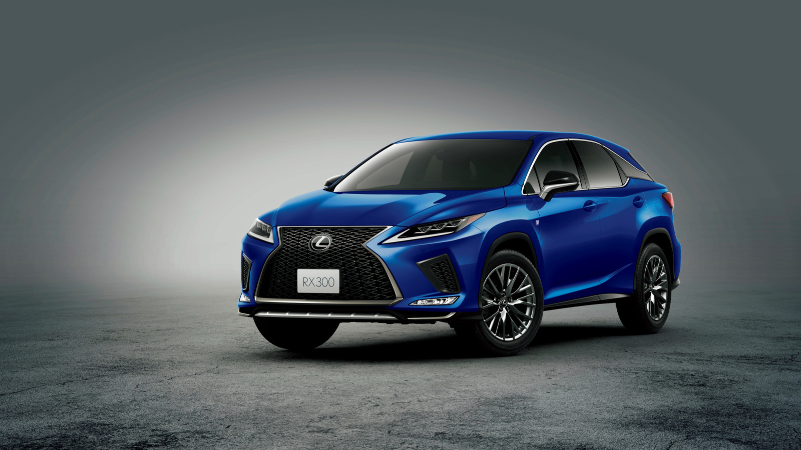 Синий автомобиль Lexus RX 300 F SPORT 2019 года на сером фоне