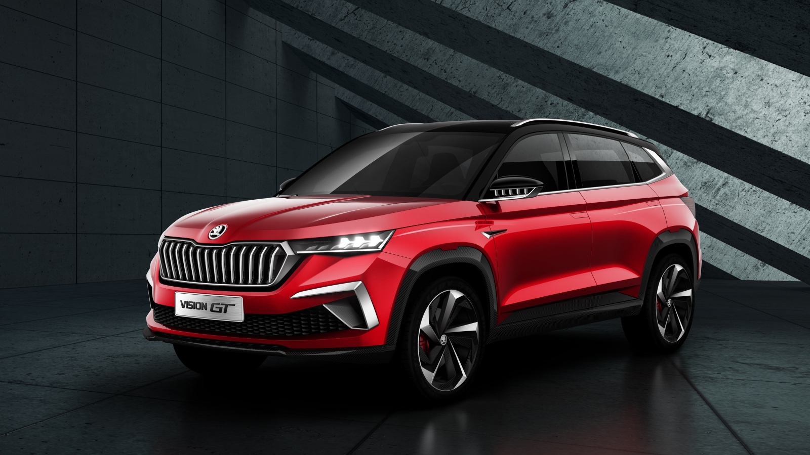 Красный внедорожник Skoda Vision GT 2019 года на сером фоне
