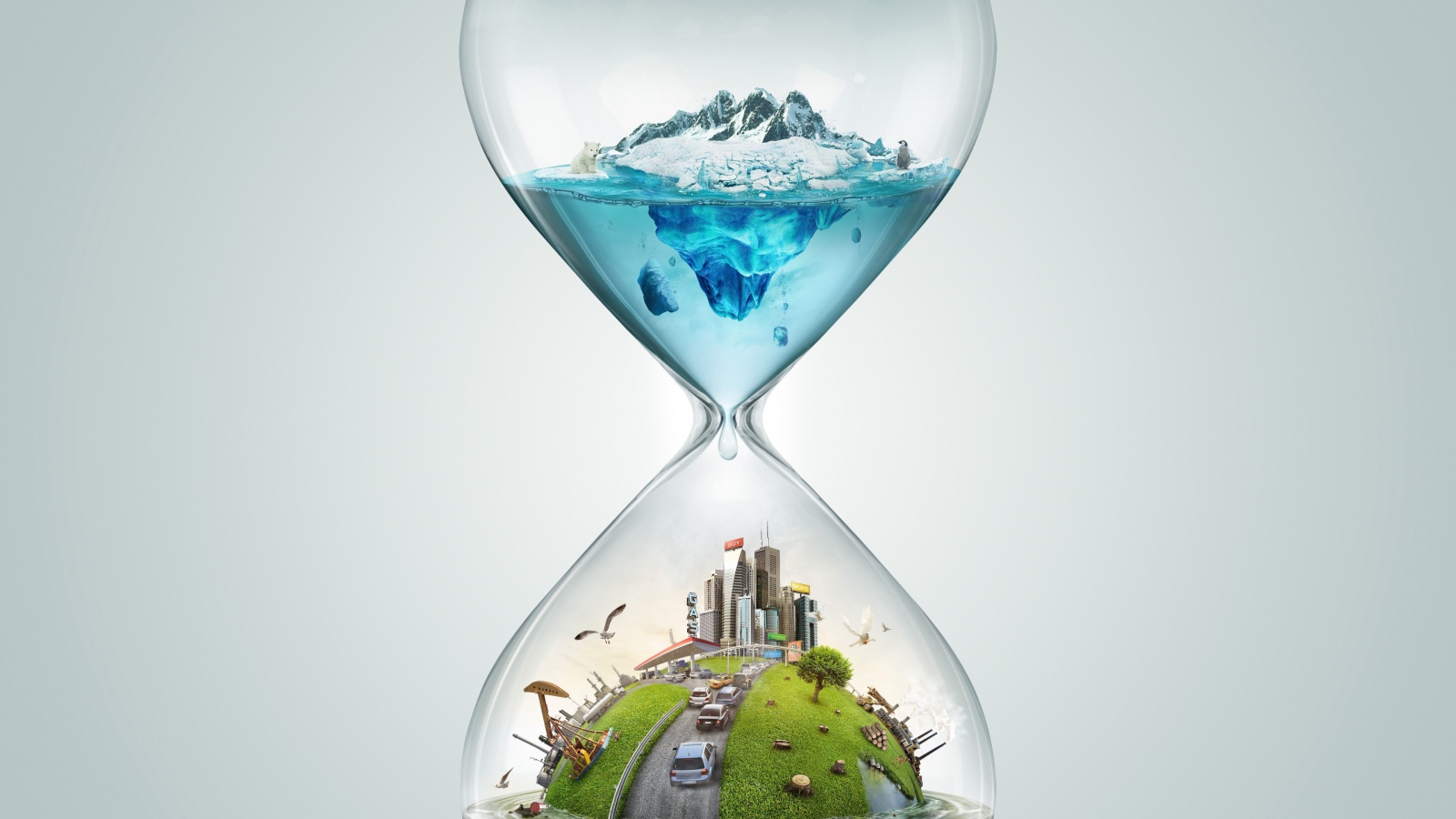 Креативные песочные часы на сером фоне