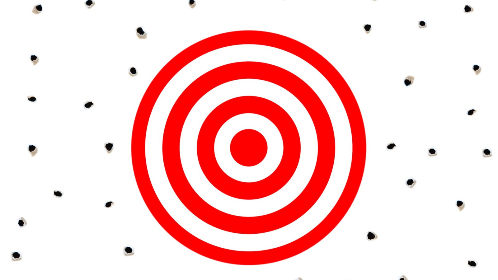 Красная мишень на белом фоне с дырками от пуль