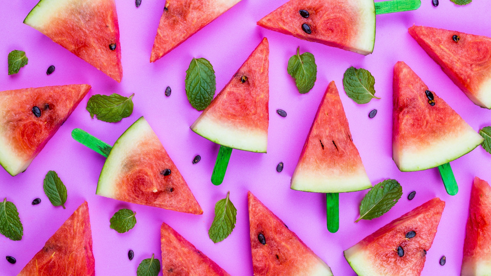 Pieces of sweet watermelon on a lilac background