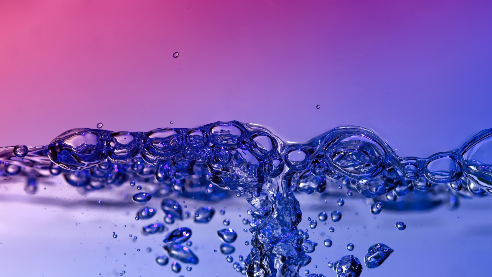 Water bubbles on purple background