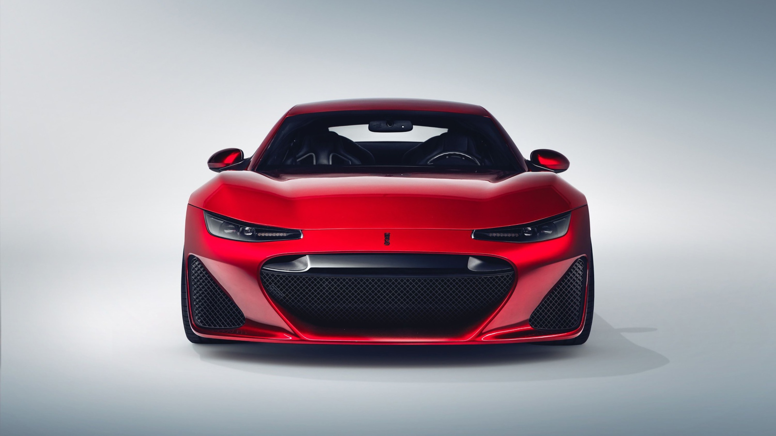 Красный автомобиль  Drako GTE, 2020 года вид спереди