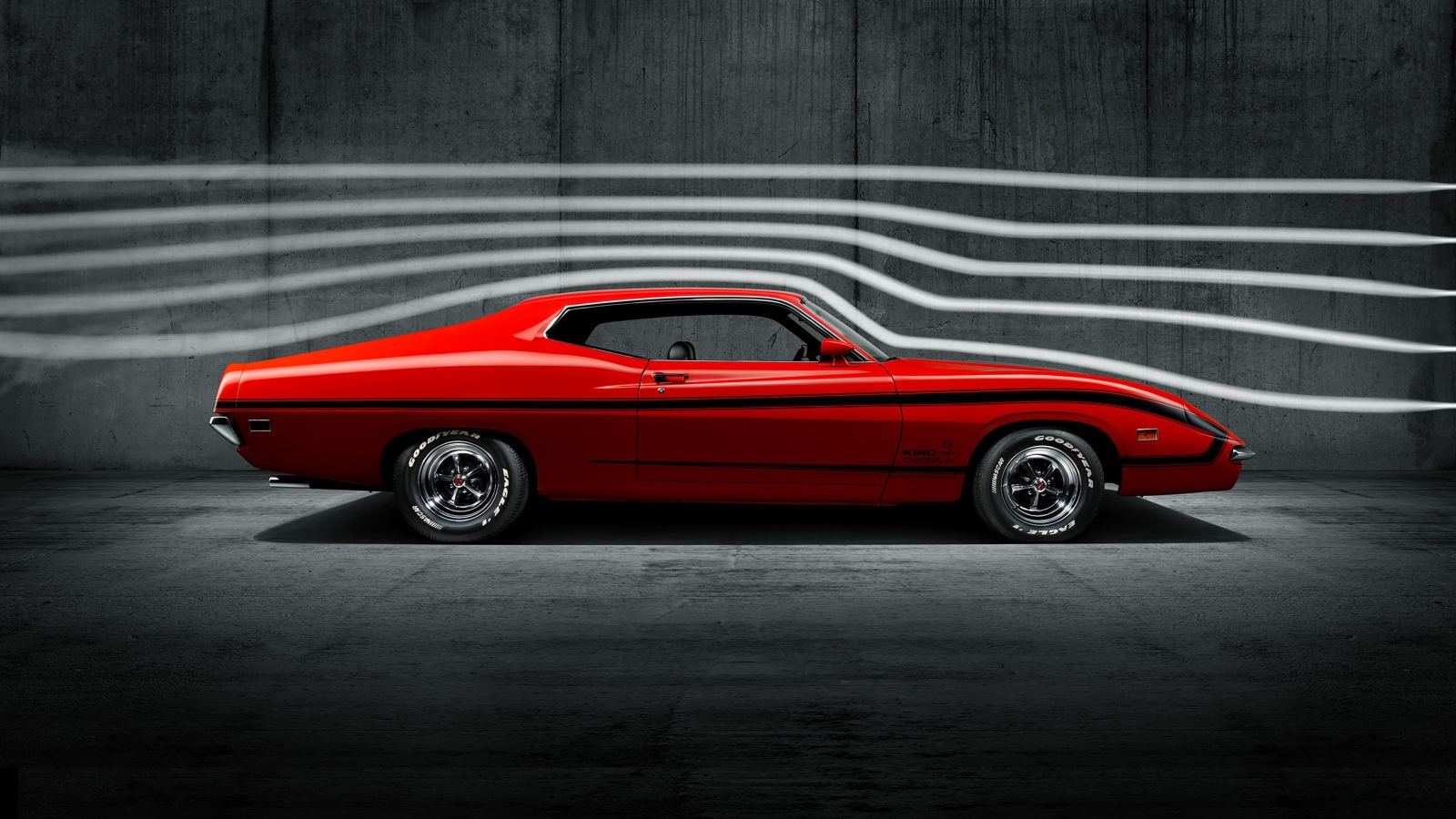 Красный ретро автомобиль Ford Torino King Cobra, 1970 года