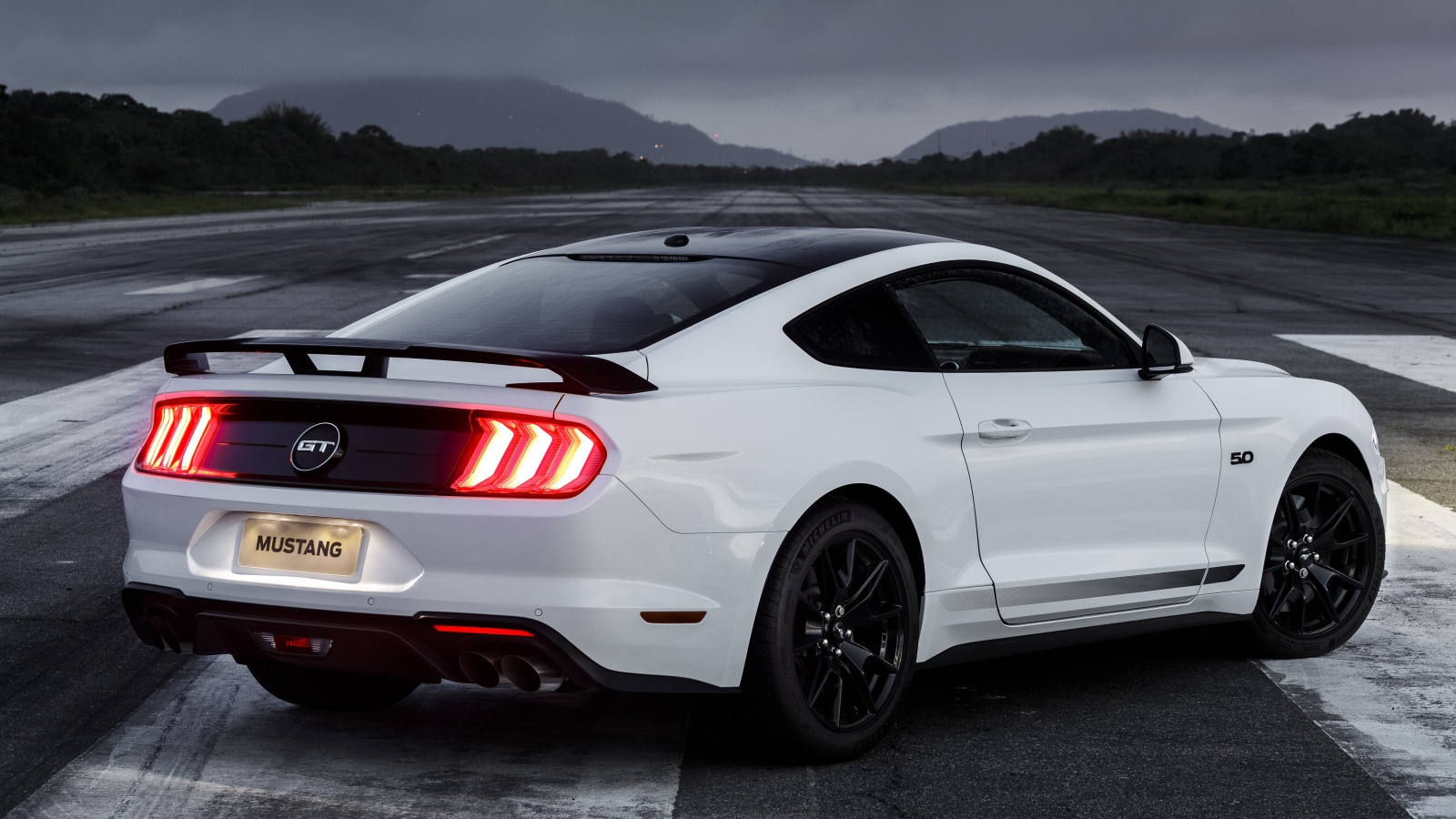 White Ford Mustang GT car, 2019 rear view