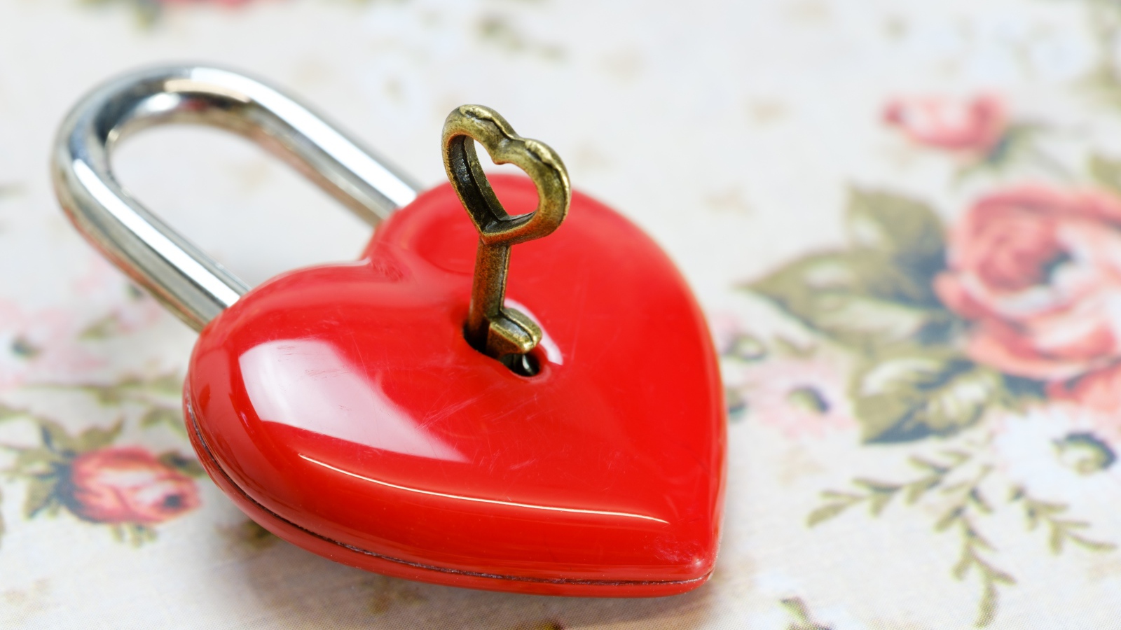 Red heart shaped lock with key