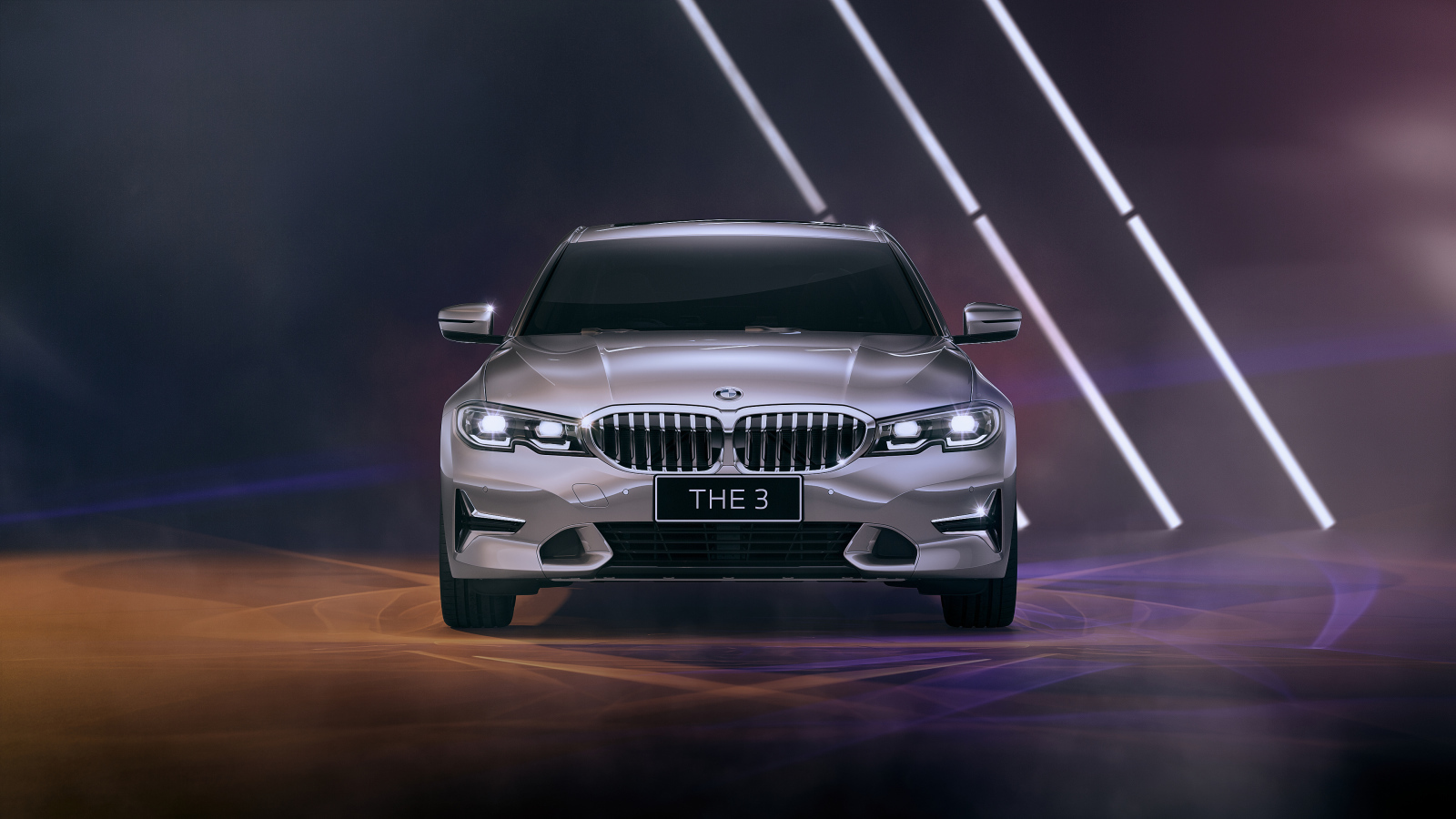Серебристый автомобиль BMW 330Li Luxury Line 2021 года