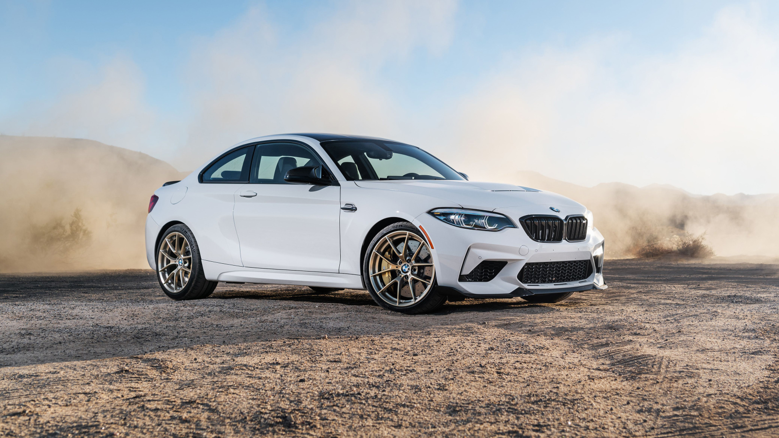 White BMW M2 CS, 2021 covered in dust