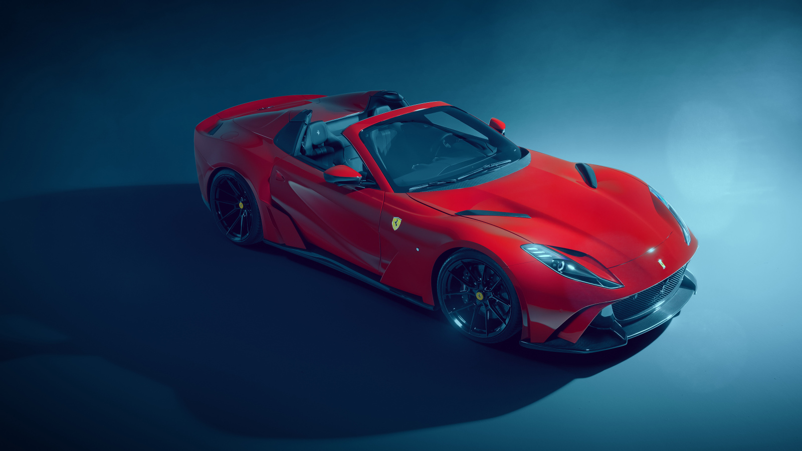 Красный автомобиль  Ferrari 812 GTS N-Largo 2021 года на сером фоне 