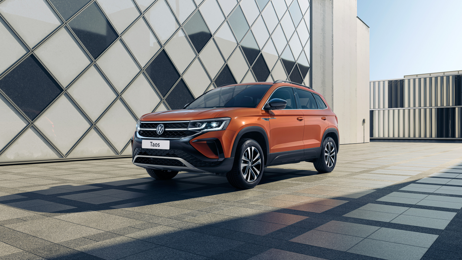 Внедорожник Volkswagen Taos 4MOTION 2021 года у стены