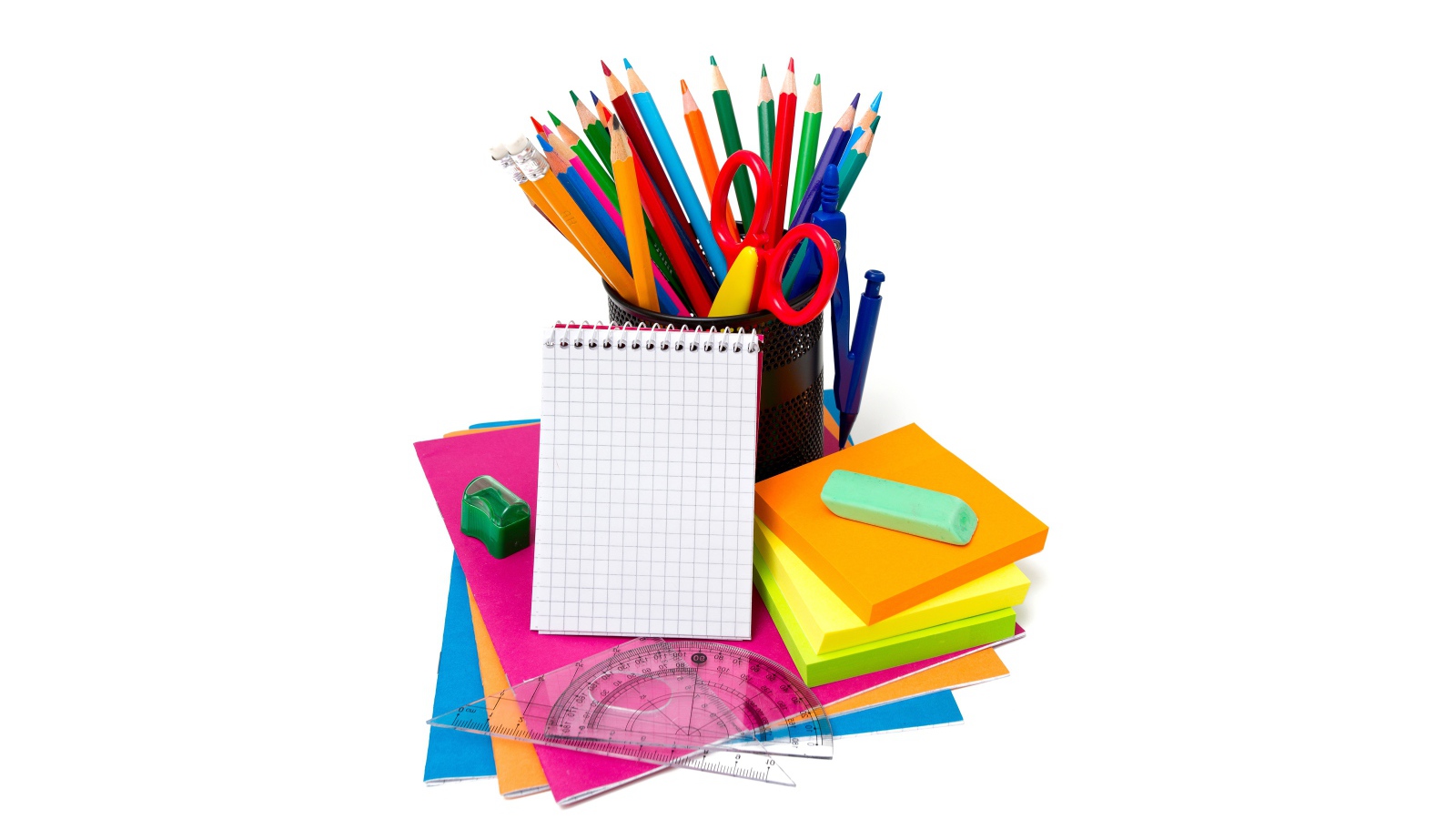 Яркие разноцветные канцелярские предметы на белом фоне 