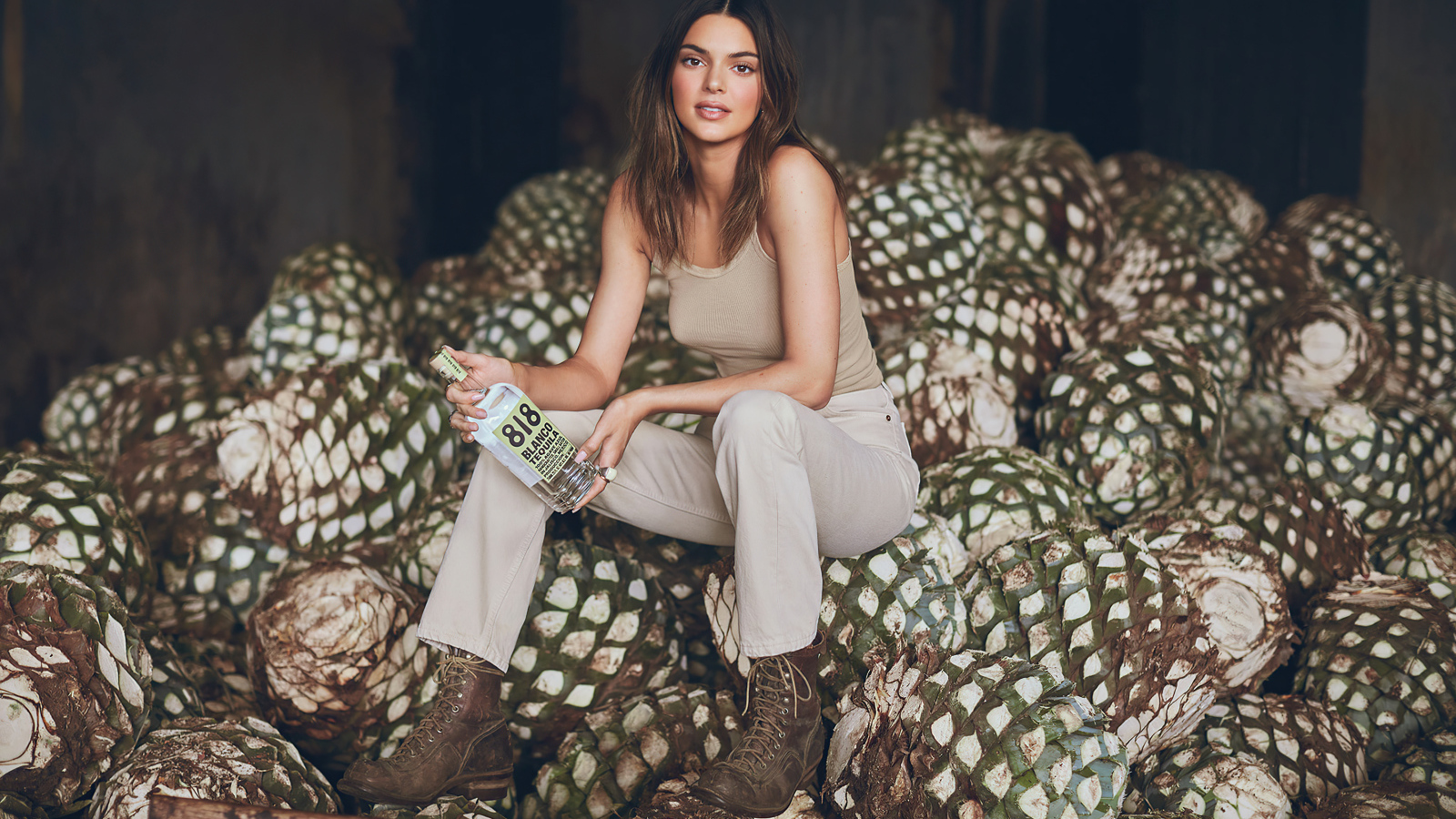 Model Kendall Jenner with a bottle in her hand
