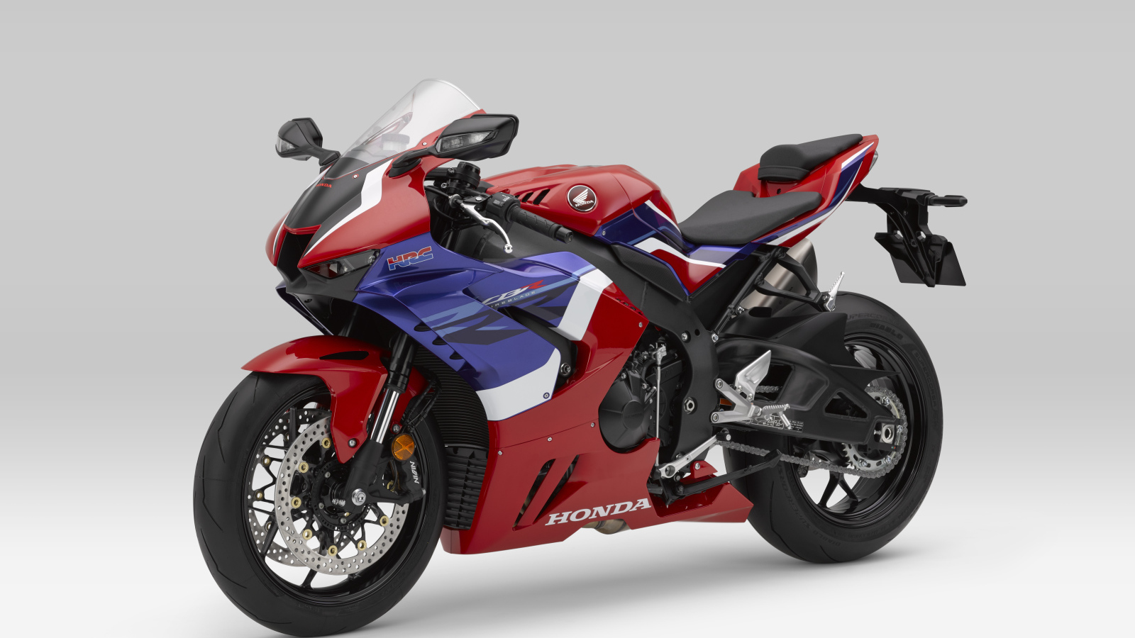 Мотоцикл Honda CBR1000RR-R Fireblade на сером фоне
