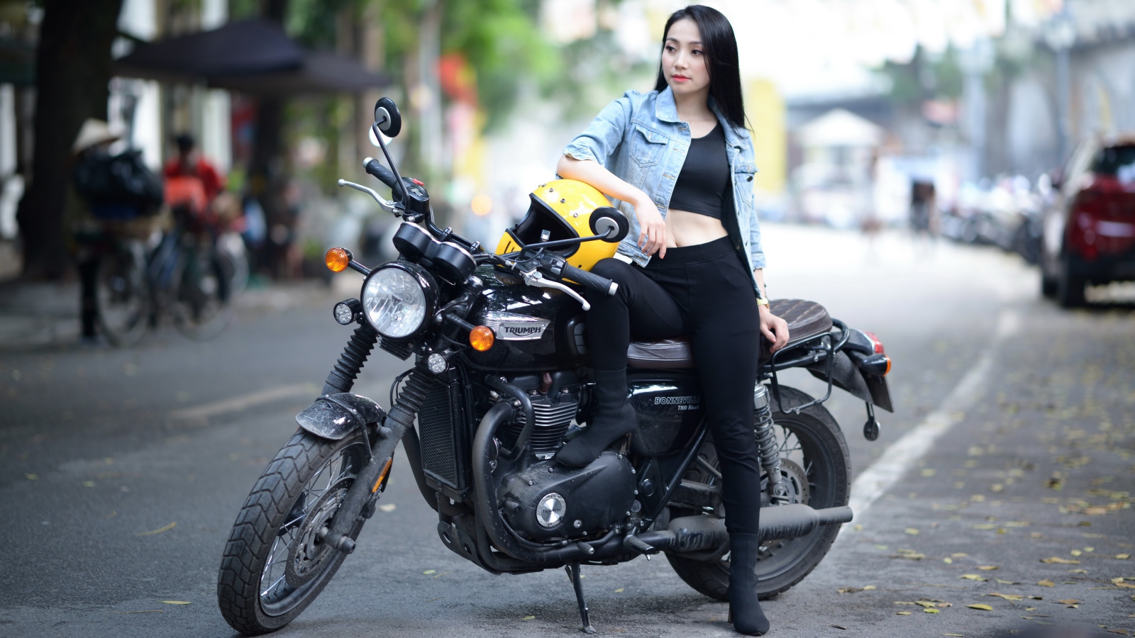 Beautiful asian girl on a motorcycle